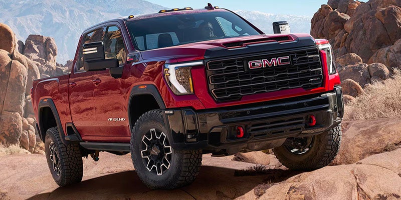 Close-up of 2025 GMC Sierra 2500 HD grille and headlights